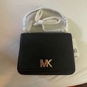 Micheal Kors cross body purse
